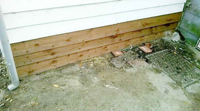 New weather boarding fixed to the outside of kitchen