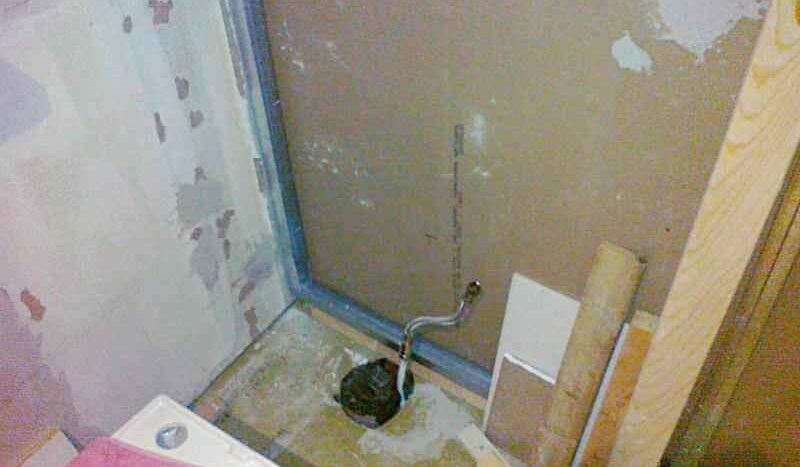 new hole cut in floor for soil pipe