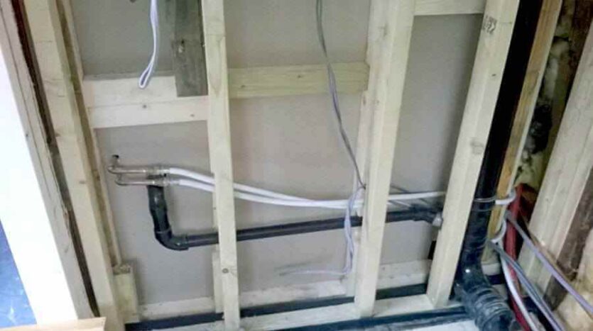 plumbing and studwork in WC and kitchen wall
