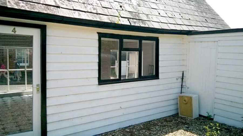 rear elevation of shop and len to extension