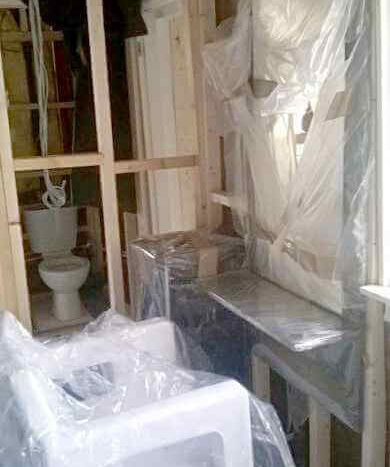 setting out the noggins for the wall mirror fixings in relation to the styling chairs