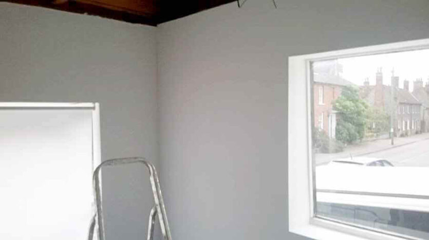 south east corner of shop dry lined 