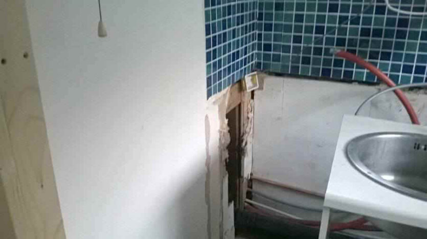temporary sink in old kitchen area