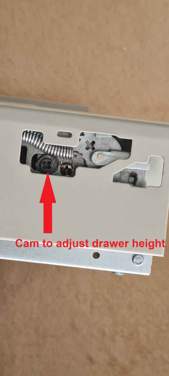 Drawer cam to adjust drawer height.