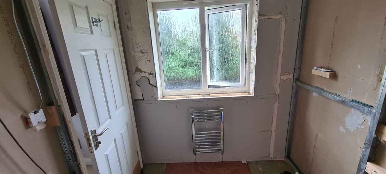 Outside wall drywalled and ready for plaster