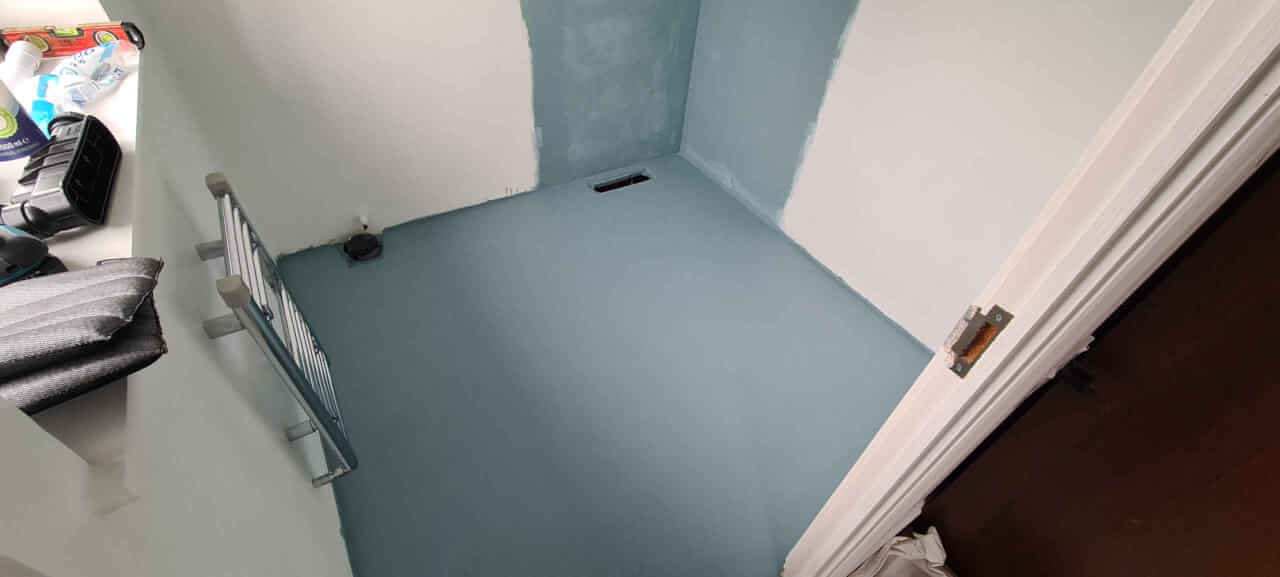 Self levelling compound poured and left to dry for 48 hours before being sealed with liquid tanking membrane