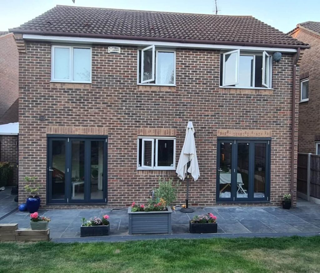 The completed install of two sets of Jeld-Wen Bedgebury bifold doors.