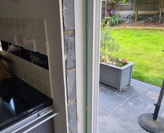 old patio door frame screwed into cavity closer scaled