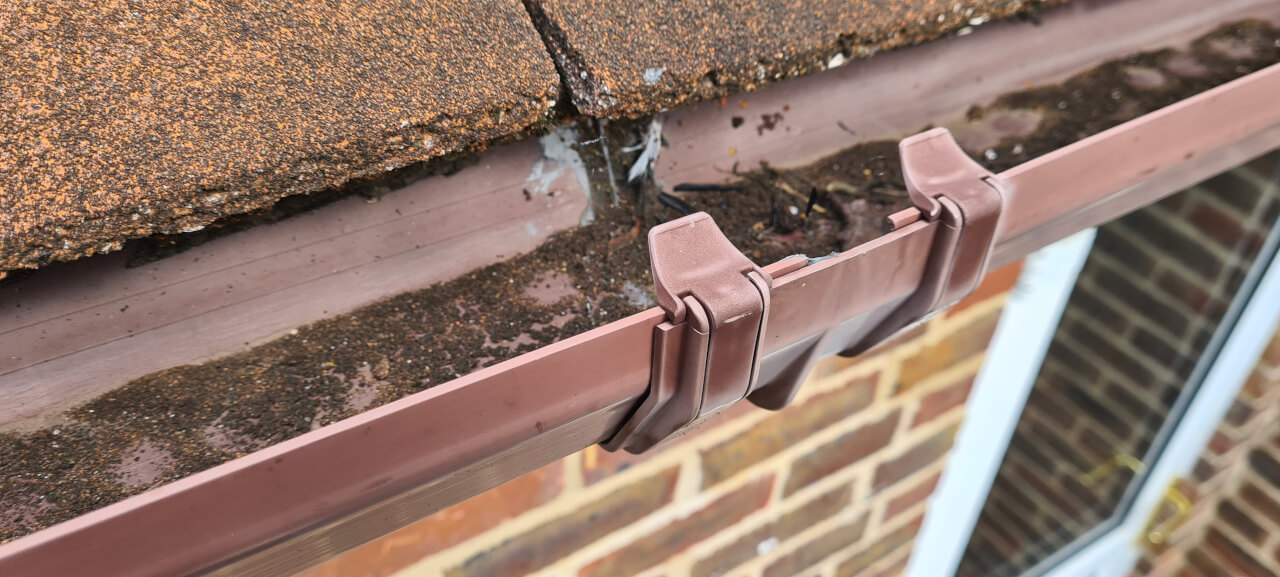 Old guttering brittle and leaky
