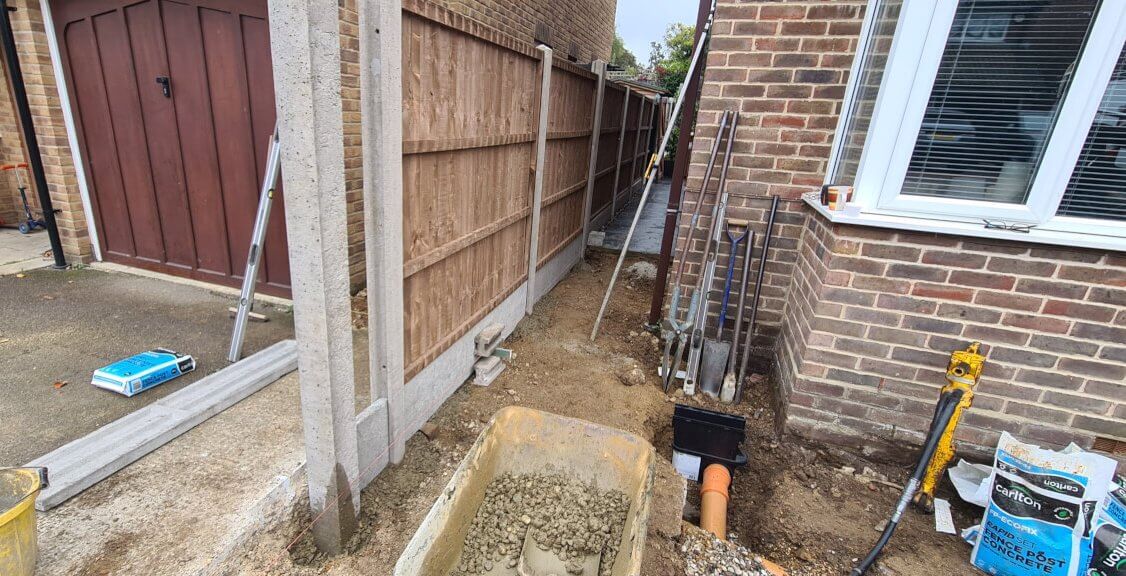 Closeboard fence being erected