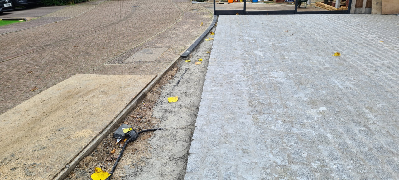 Last few rows of cobbles to be laid