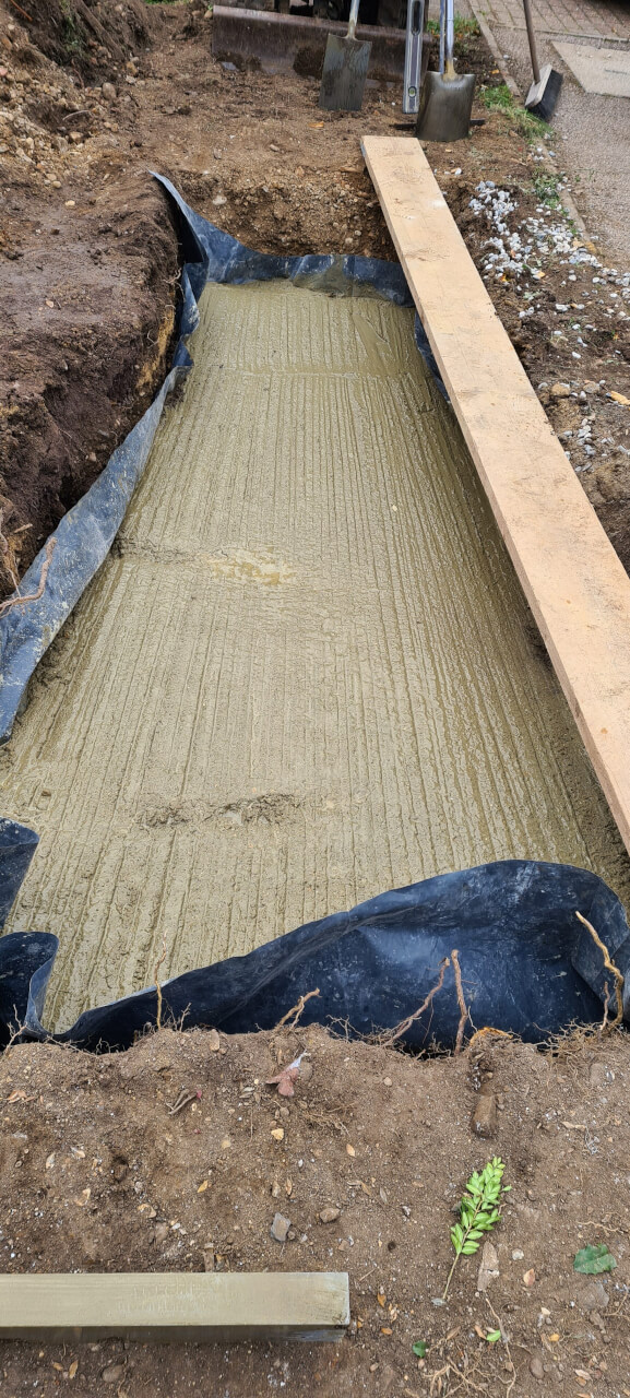 Soak away pit and crates after concrete has been poured over the top and tamped down