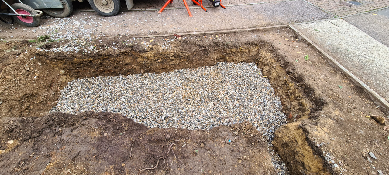 Soak away pit covered in gravel ready for concrete