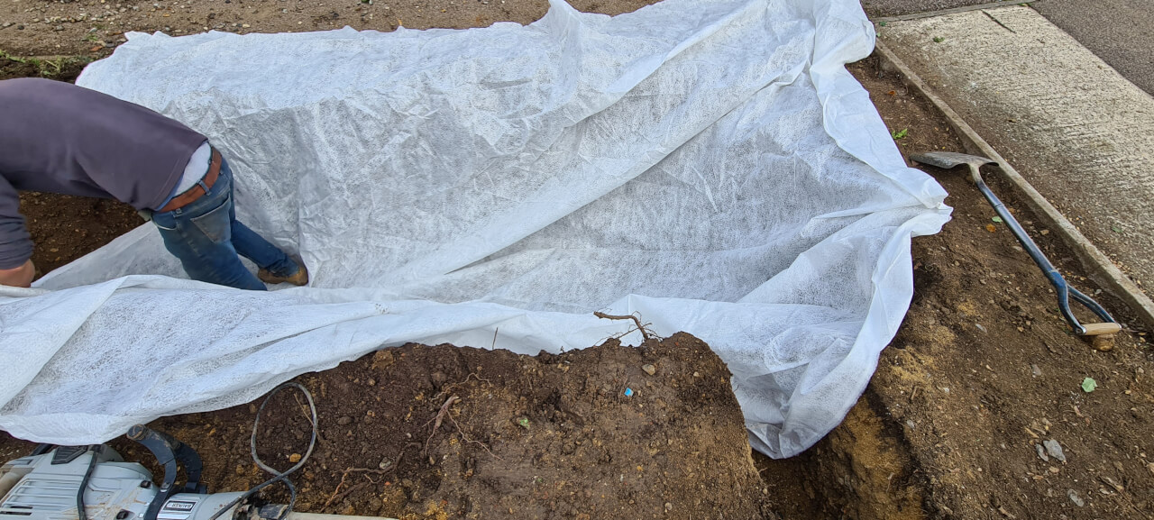Terram or geotextile filter lining covering the soak away attenuation crates