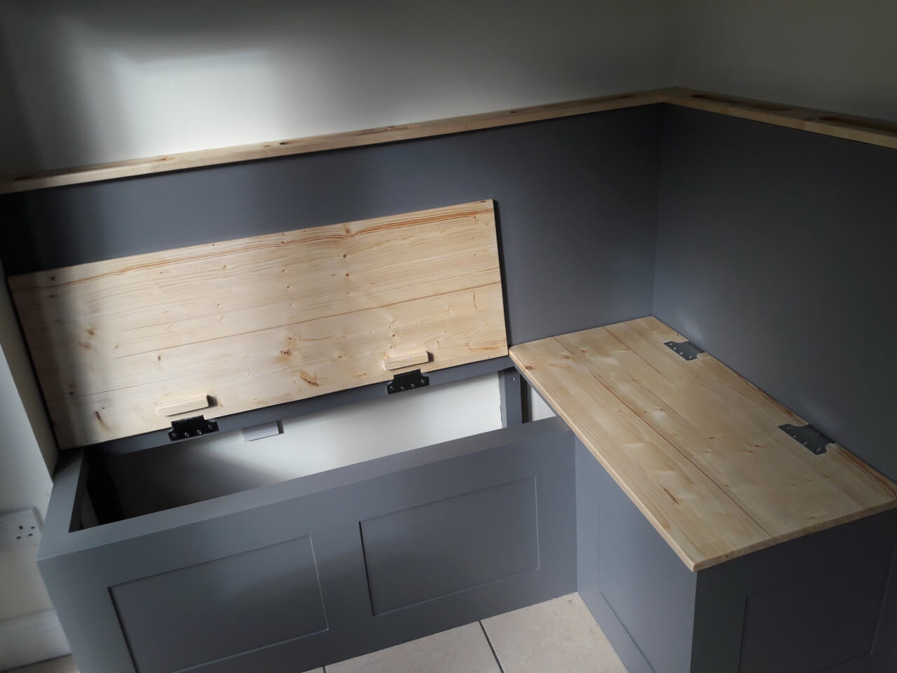 Fully finished bench seat showing one seat lid up