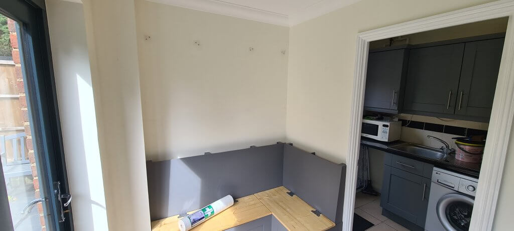 Cabinets removed and walls filled and prepped ready for wallpapering