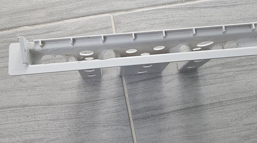 Holes cut out of Mira Flight waste tube insert to aid drainage