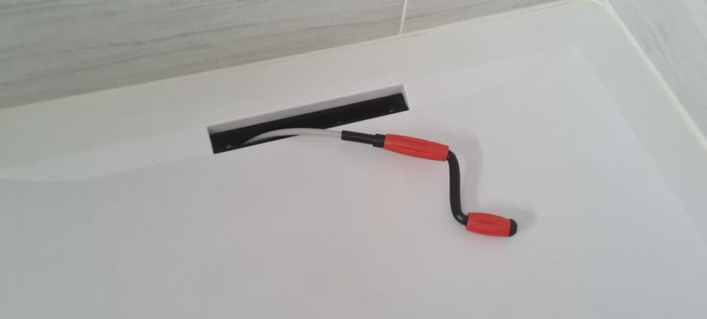 Making sure the channel drain waste tube outlet is clear