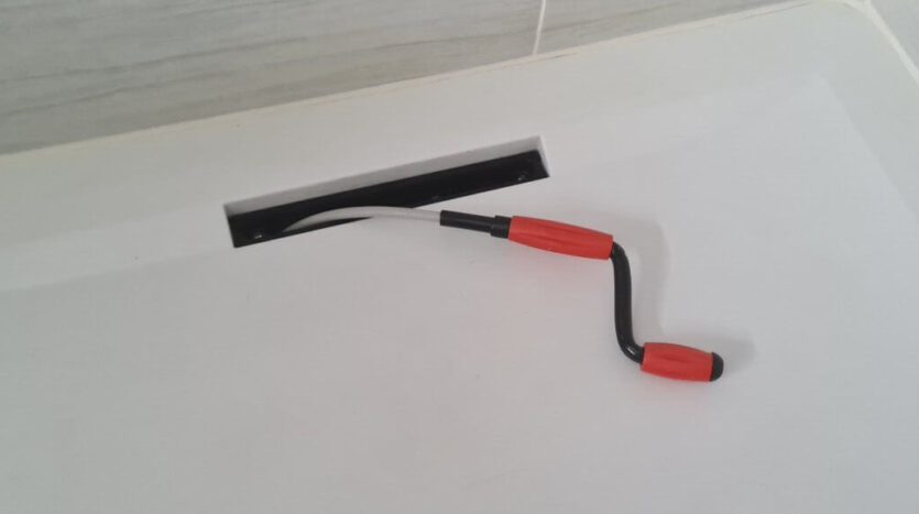Making sure the channel drain waste tube outlet is clear